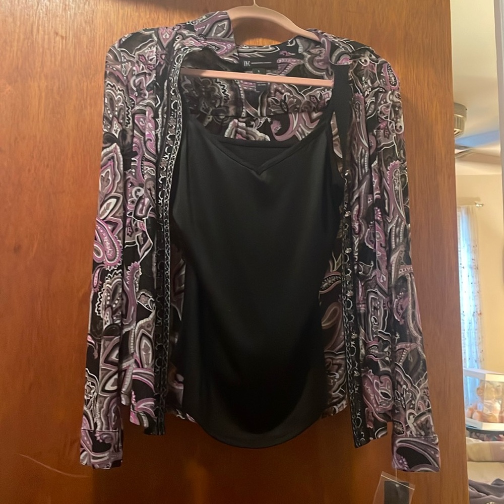 Sheer blouse with attached tank.